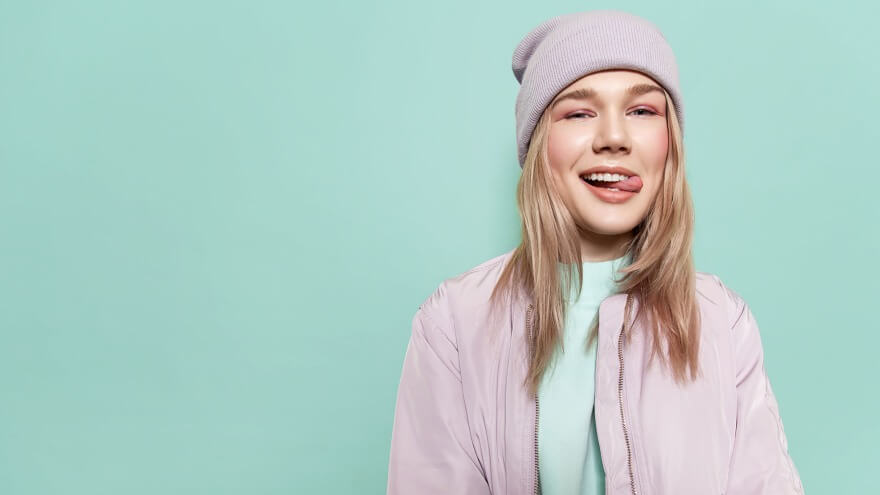 A lassie with a beanie and matching clothes