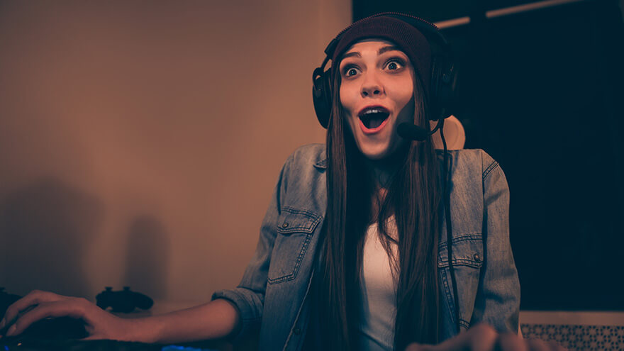 Happy egirl streaming a playthrough with her beanie