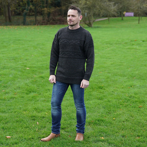 man wearing a mars knitwear british wool guernsey jumper
