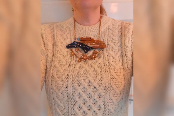 lady wearing a Mars Knitwear British wool Aran jumper