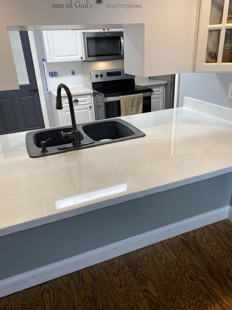 A renovated kitchen with an epoxy countertop