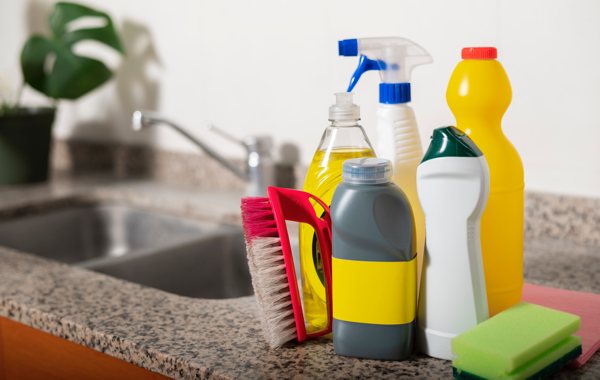 A variety of houshold cleaning chemicals, such as dish soap and multi-surface cleaner.