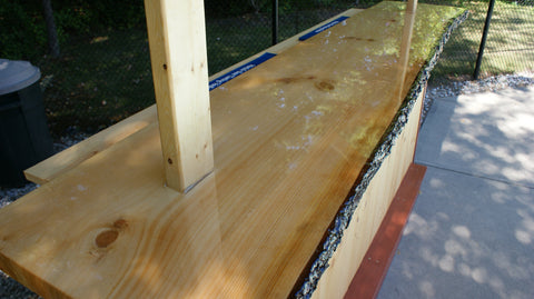 An epoxy bar top with a live edge