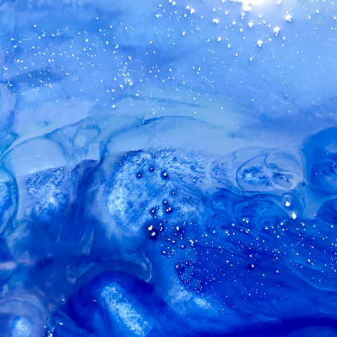 A close-up view of blue-pigmented epoxy resin