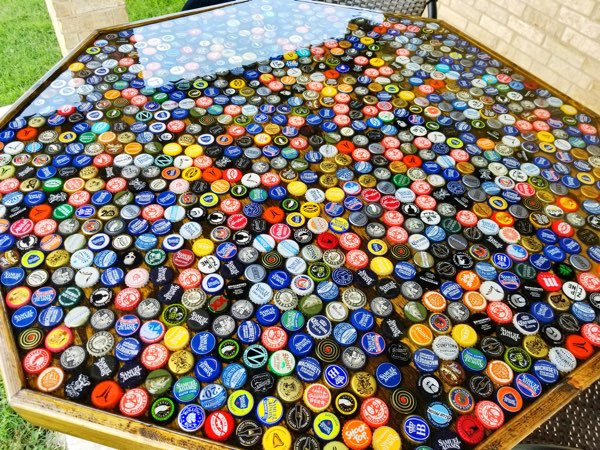 A close up view of an epoxy bottle cap table top