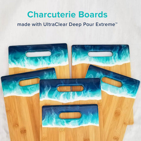 Six different ocean-themed epoxy charcuterie boards