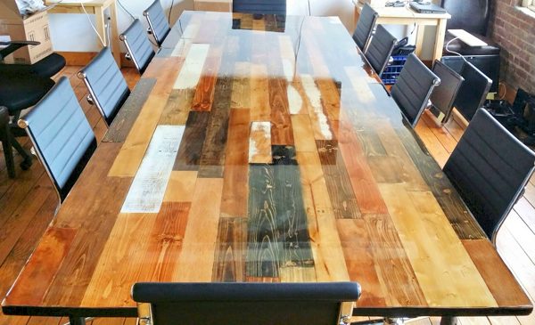 A wooden epoxy conference table
