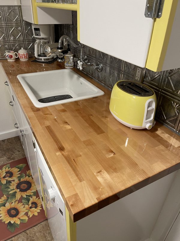 A user-submitted photo of a finish epoxy kitchen countertop project, made using UltraClear Table Top Epoxy.