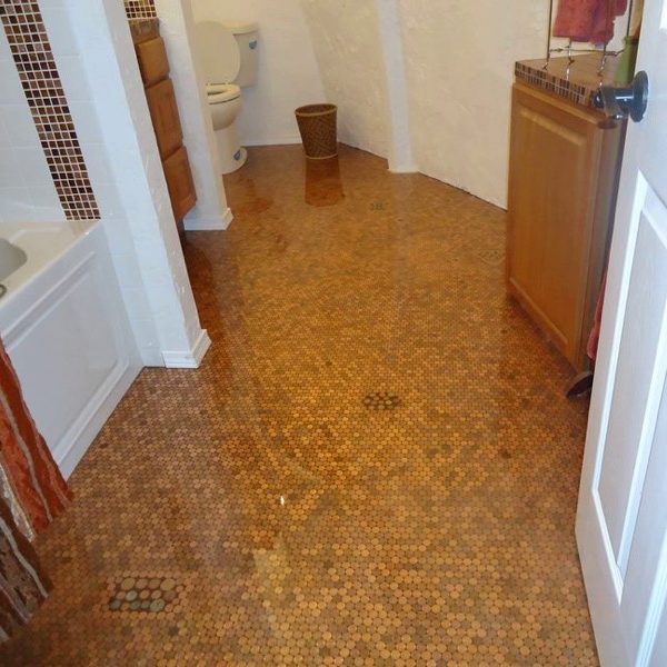 An epoxy penny bathroom floor, long view