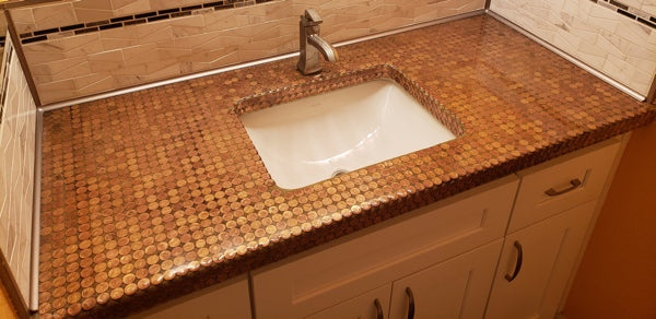 An epoxy penny countertop with a sink