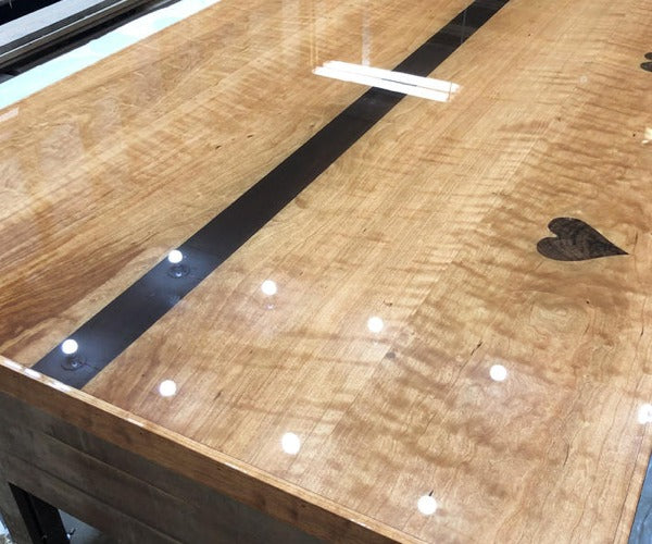 An epoxy bar top with a clean finish.