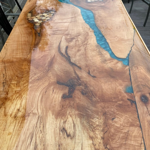 An epoxy bar top with a smooth, clean bar top epoxy finish.
