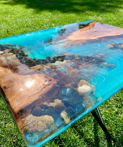 A large ocean-themed deep pour epoxy table top