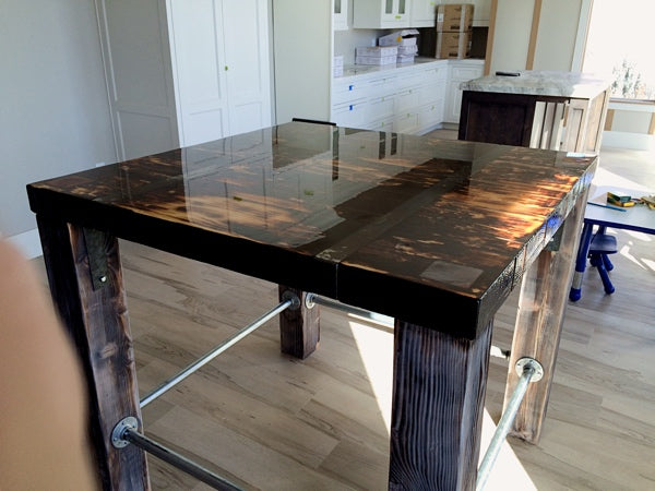 An indoor epoxy table top with brown and black color