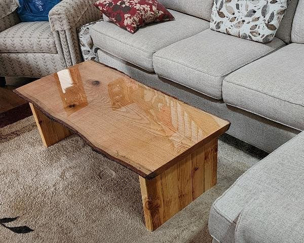 A wooden epoxy coffee table.