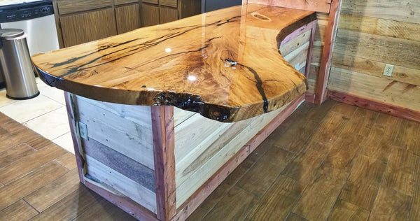 A finished wooden epoxy countertop with a live edge