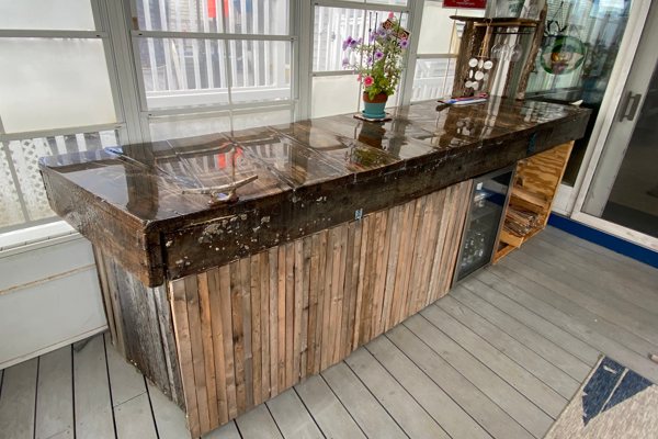A commercial wooden epoxy bar top.