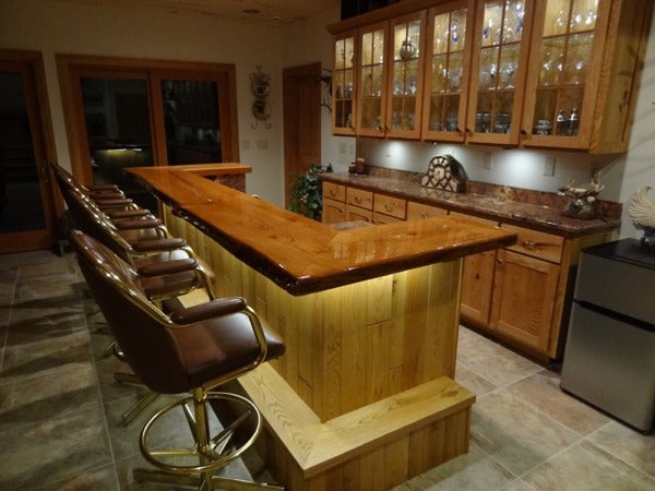A wooden epoxy bar top with an UltraClear Bar Top Epoxy finish.
