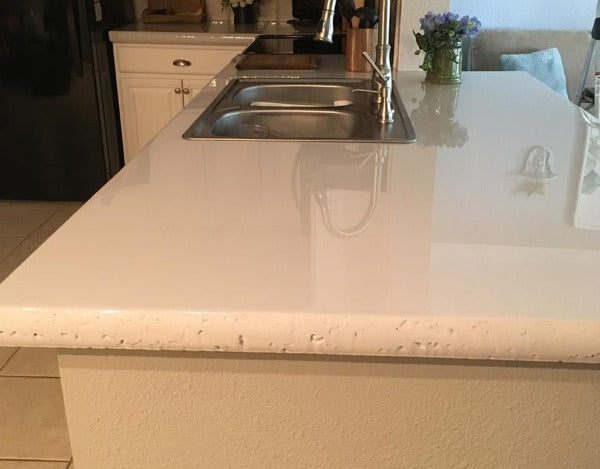 A concrete epoxy countertop, made using UltraClear Bar Top Epoxy, which provides a waterproof seal and enhanced durability.