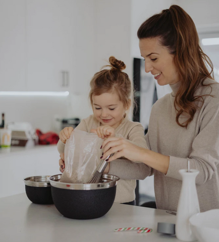 mom cooking with kid fun things to do for mothers day