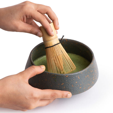 Matcha whisking in a bowl