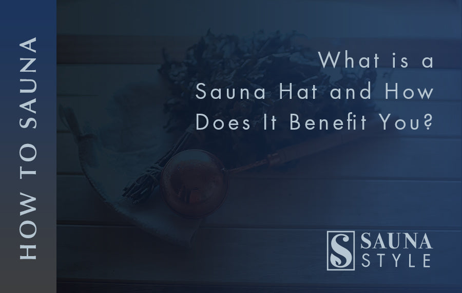 Sauna hat, birch vihta, and copper ladle on sauna bench