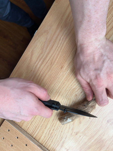 cutting rope with a folding knife