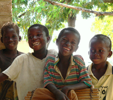 village boys sharing a laugh in Bourra, Burkina Faso, West Africa 2004