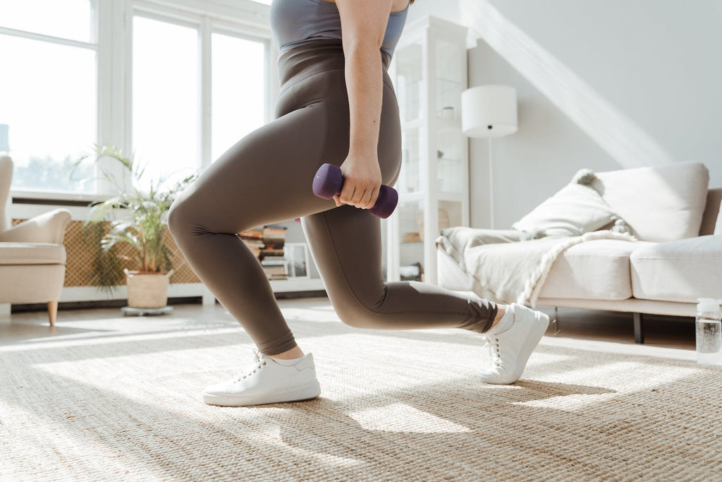 Woman using a dumbell