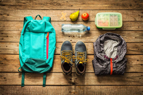 Packing a go-bag for hiking with extra food, clothes and water