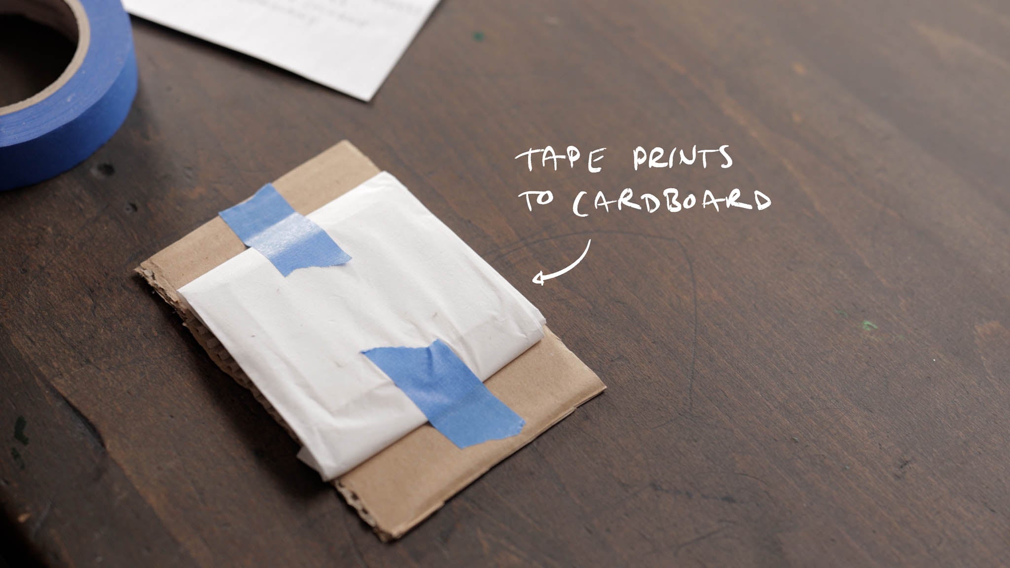 Use cardboard to secure prints.