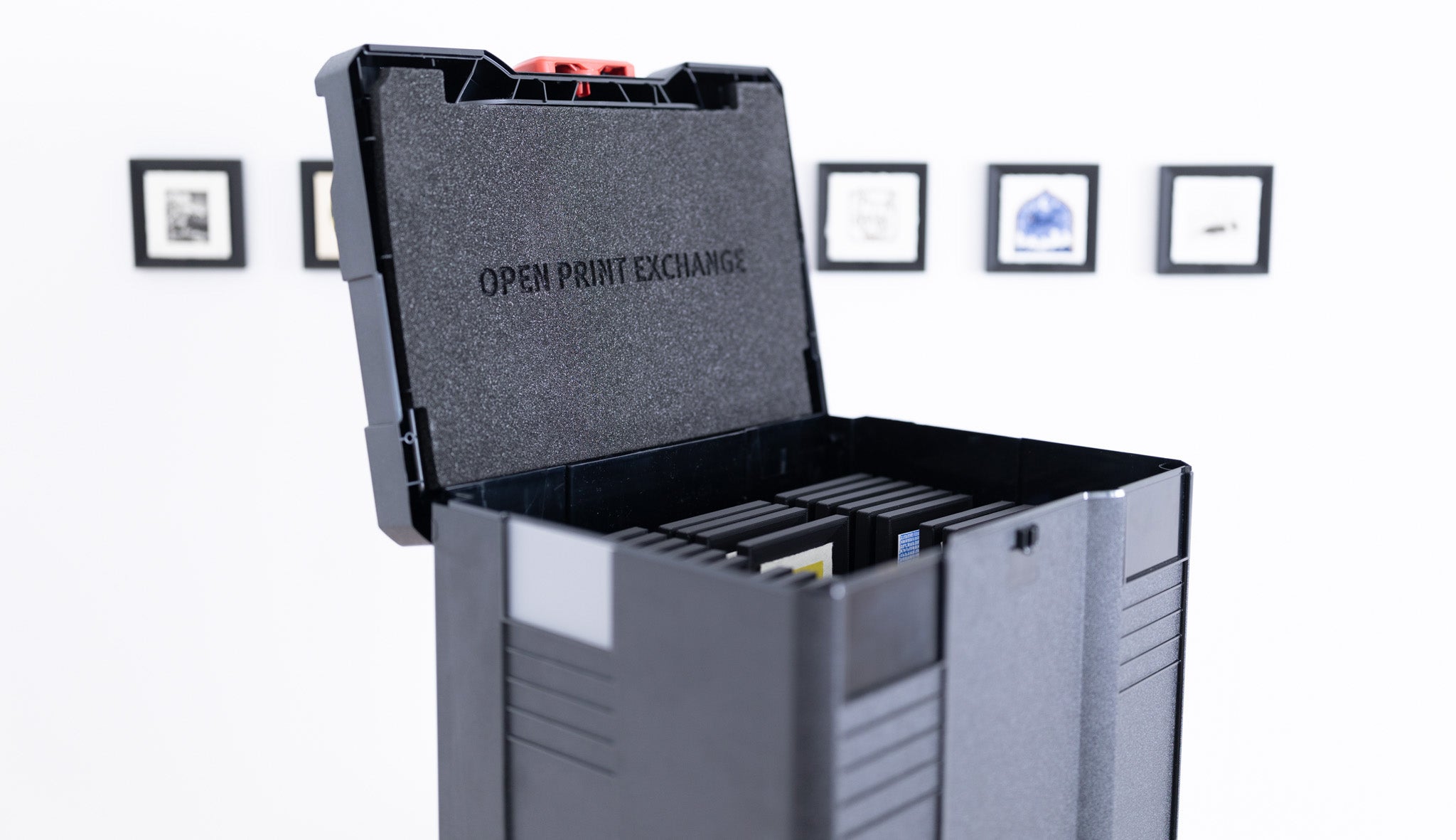 A photo of the OPE Box, which we use to ship tiny prints all over the world.