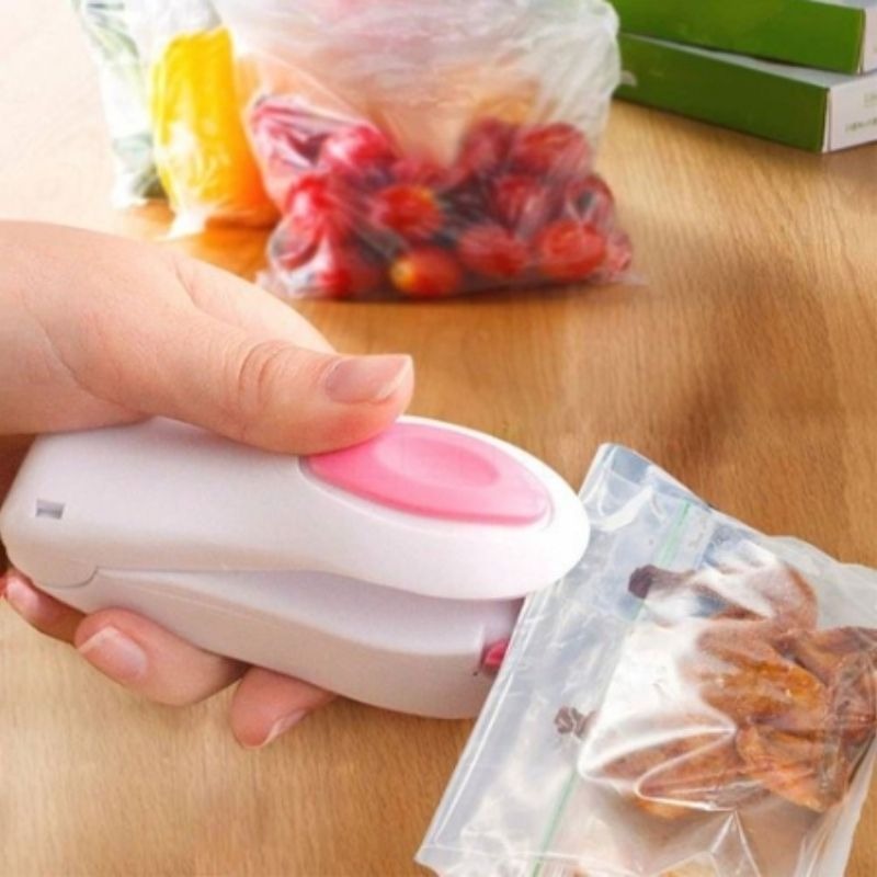 Mini seladora de embalagens a vácuo portátil a pilha que conserva os alimentos por mais tempo
