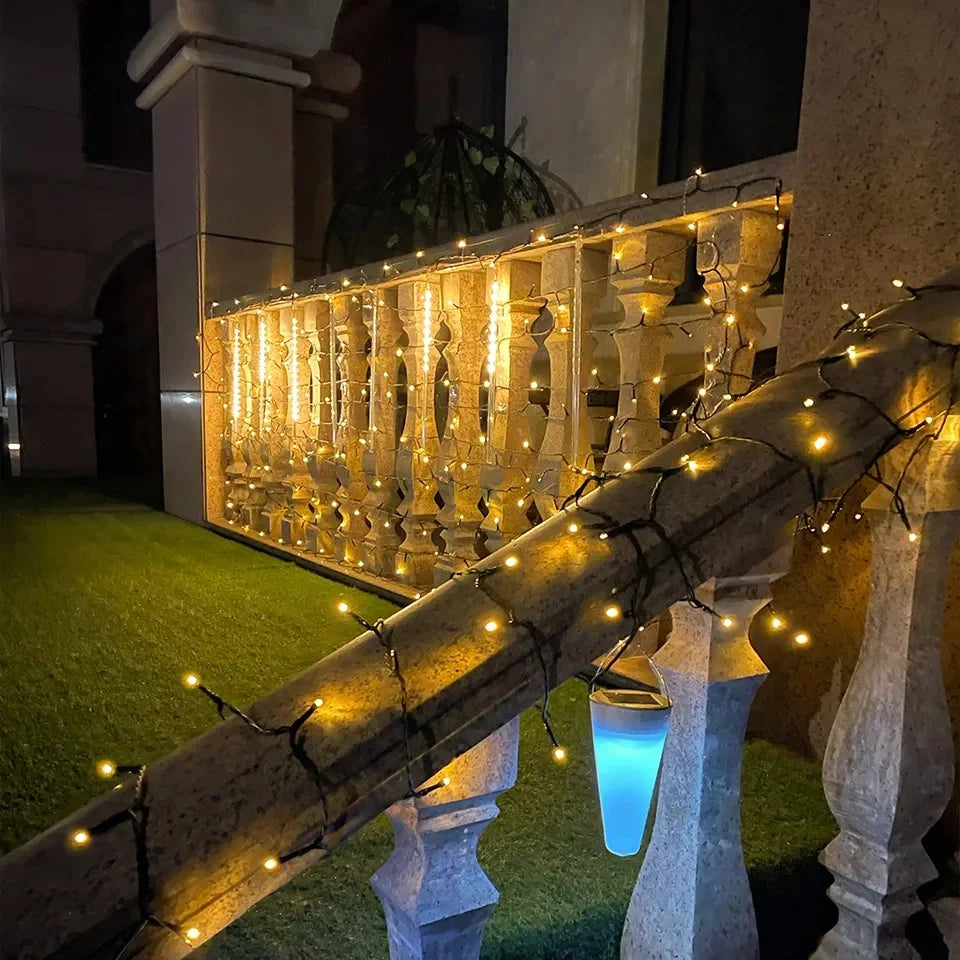 Guirlanda LED Fairy 100M Quntis: Iluminação Branca Quente, Segura e Versátil para Decoração Natalina e Eventos Especiais