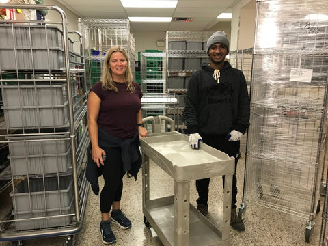 Karen Allmen, Co-Coordinator, Bloor West Food Bank and Shanil Charles, Fulfilment Team Member, Acart together with all the brand new carts and shelving