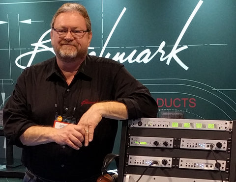 Rory Rall at NAMM 2016 with a rack of Benchmark gear