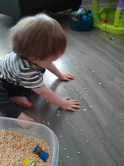 boss baby crushing cereal, bundle of joy box, sensory fun with toddlers, toddler fun ideas