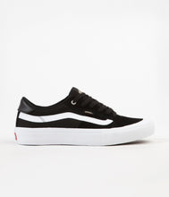 vans style 112 pro black white