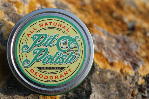 sustainable tin of natural deodorant in outdoor setting