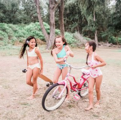 sustainable kids bathing suits children at the beach 