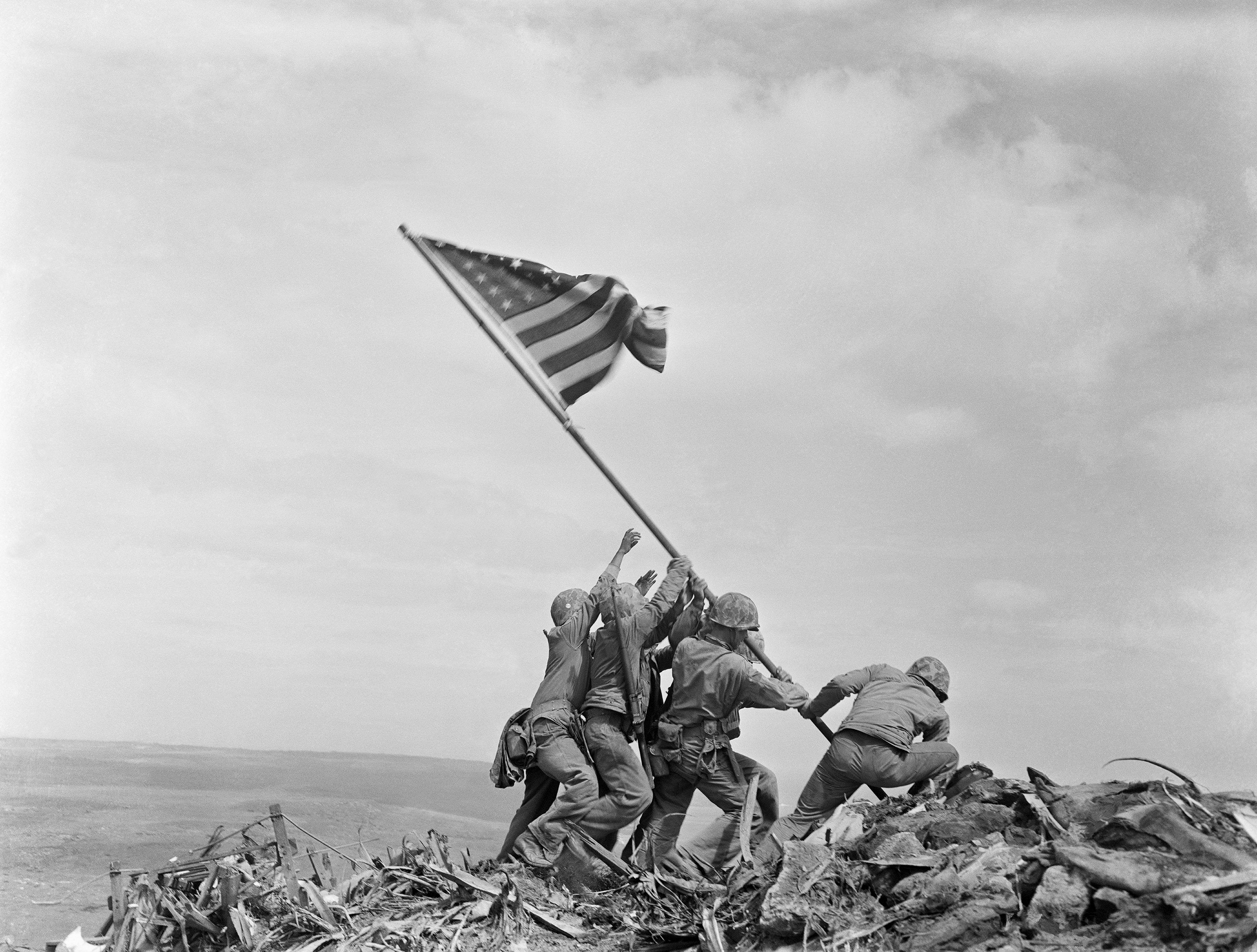 By Joe Rosenthal - https://www.apnews.com/f00e1181d57a414a848ac96b772839fddirect linkThis file was derived from: Raising the Flag on Iwo Jima, larger.jpeg, Public Domain, https://commons.wikimedia.org/w/index.php?curid=77823832
