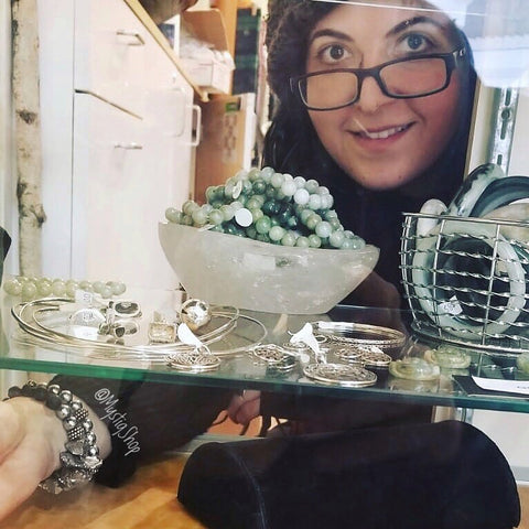 Marina from behind the glass display at the Shiny Company