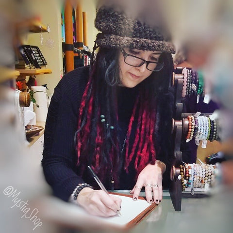 marina writing up list of jewelry at The Shiny Company