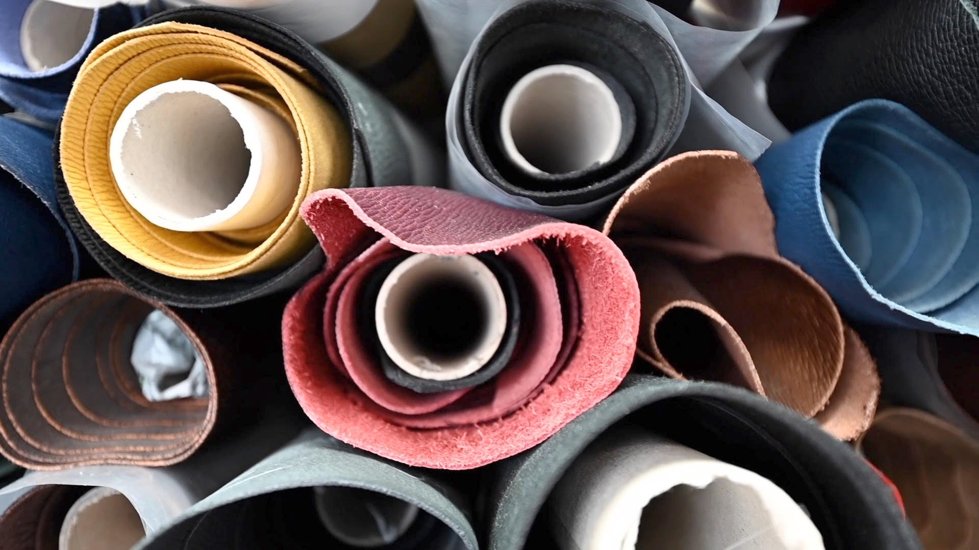 Atelier Verdi rolls of multi-coloured leather at the tannery