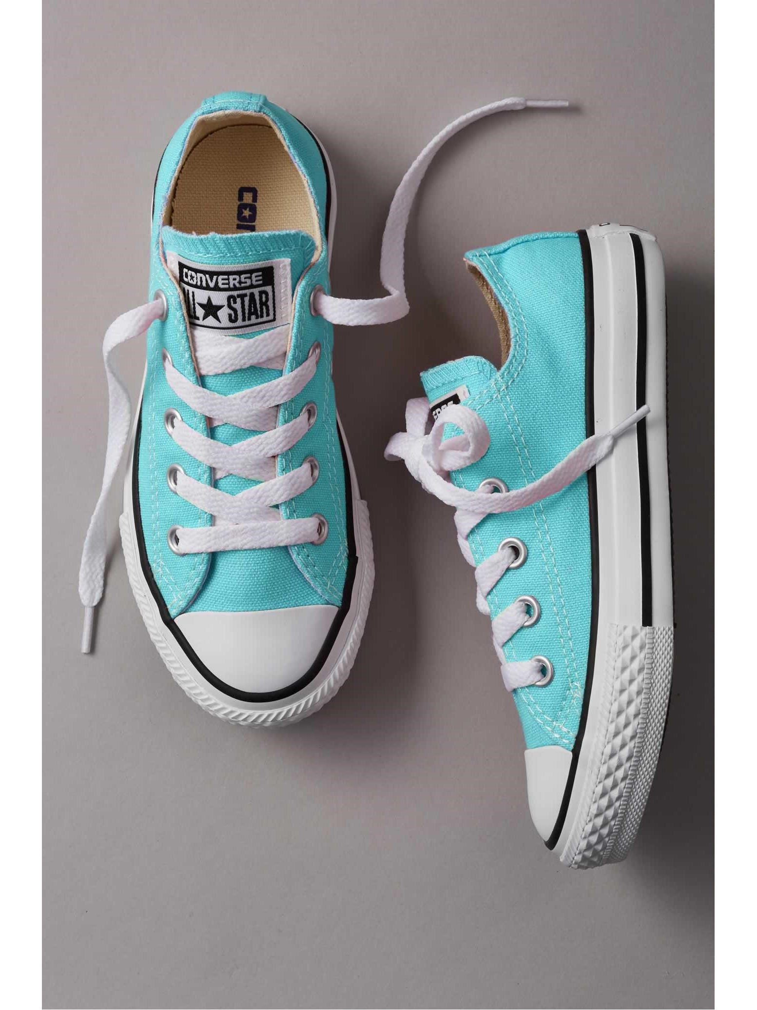 turquoise low top converse