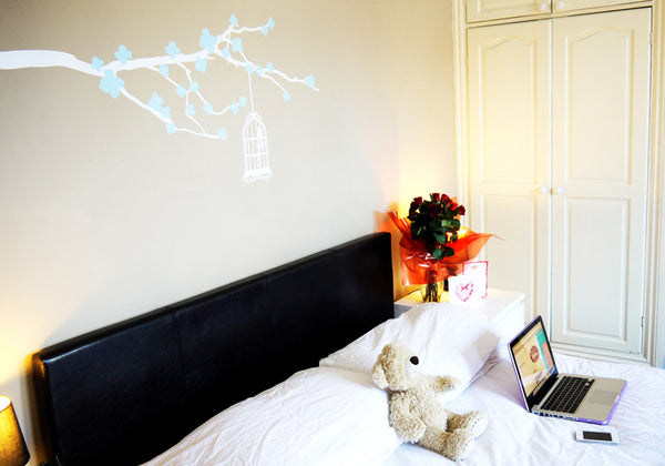 tree wall sticker above bed