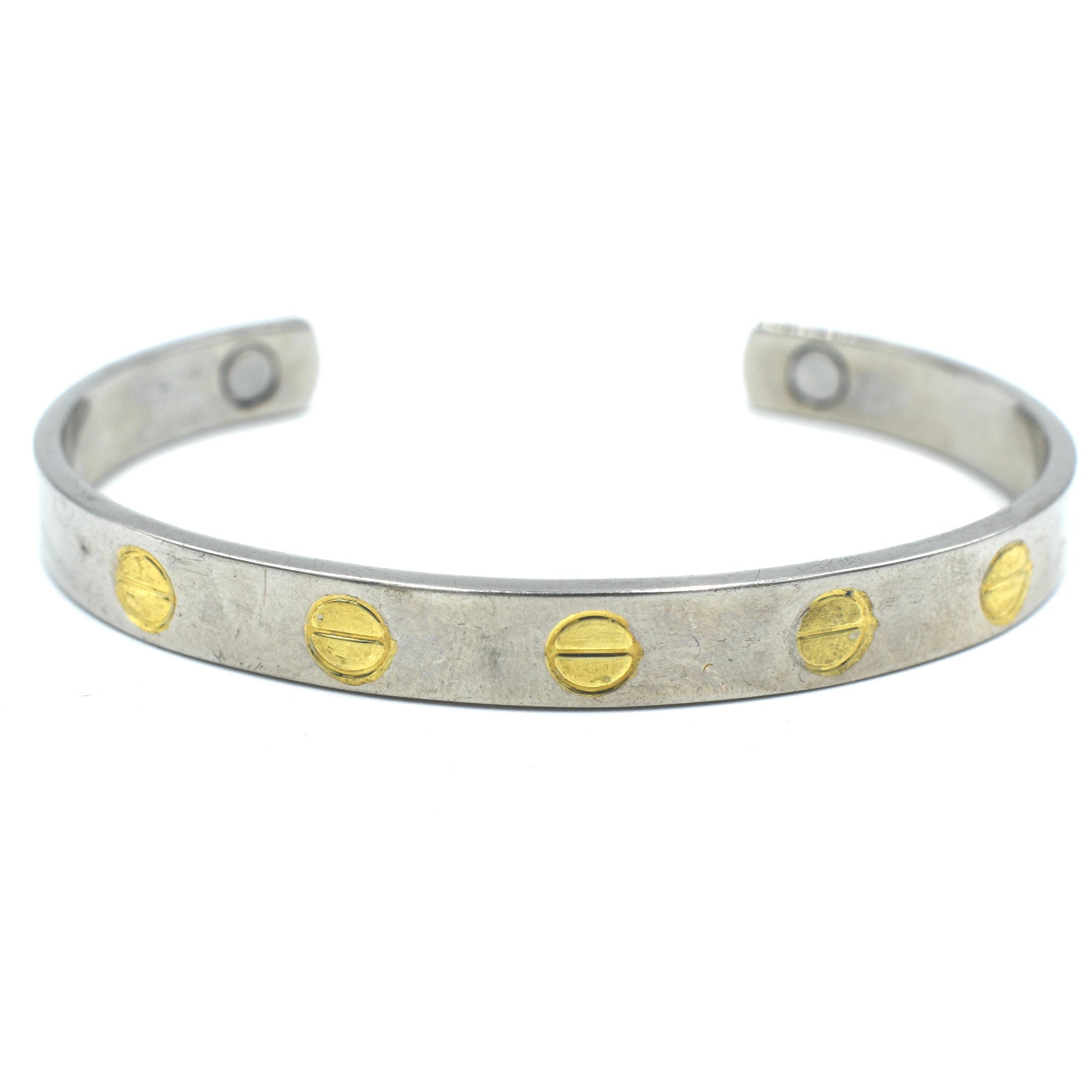 silver bracelet with gold screws