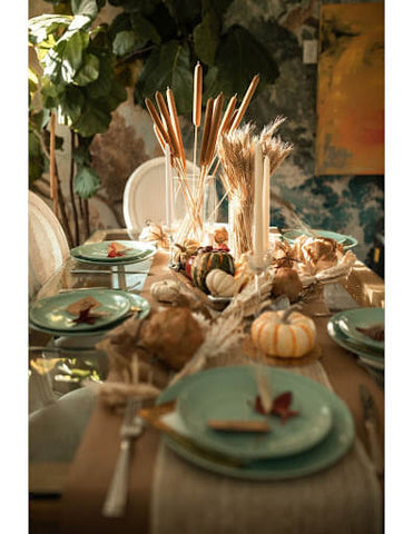 Thanksgiving table decorated with natural earth elements 