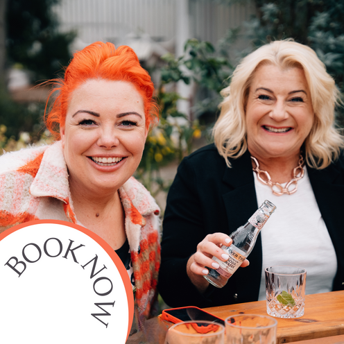 Two women enjoying a gin & tonic