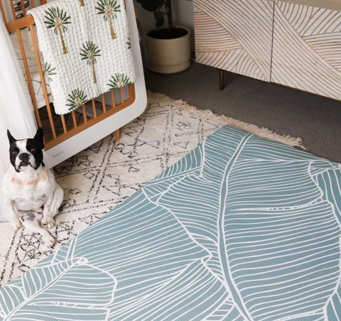 Social media influencer Simone Anderson's nursery featuring Wriggle Crew's Welcome to the Jungle Waterproof Padded Play Mat and Emerald Baby Kantha Quilt